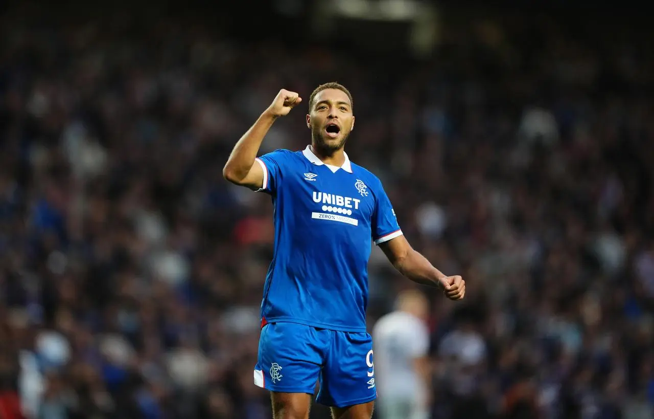 Cyriel Dessers raises his fist in celebration