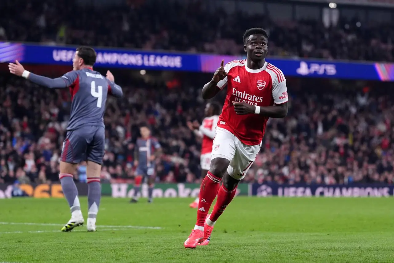 Bukayo Saka celebrates scoring against Olympiacos