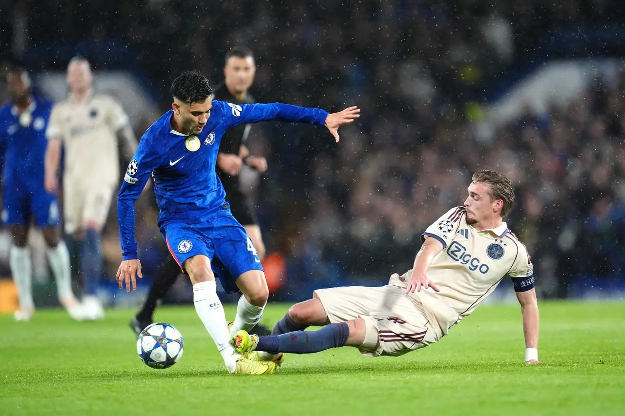 Kenneth Taylor (right) fouls Chelsea’s Facundo Buonanotte
