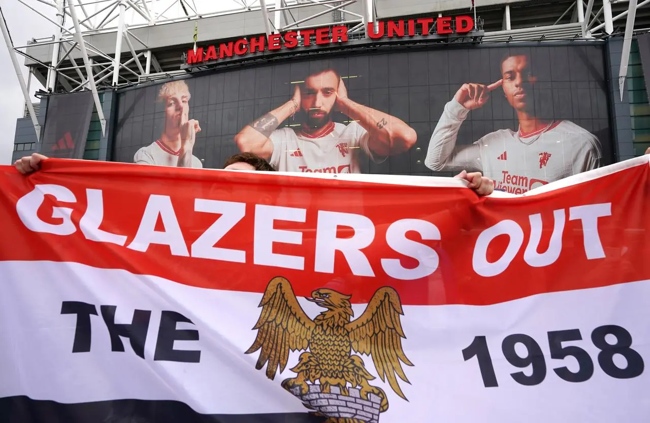 A banner outside Old Trafford saying 'Glazers out'