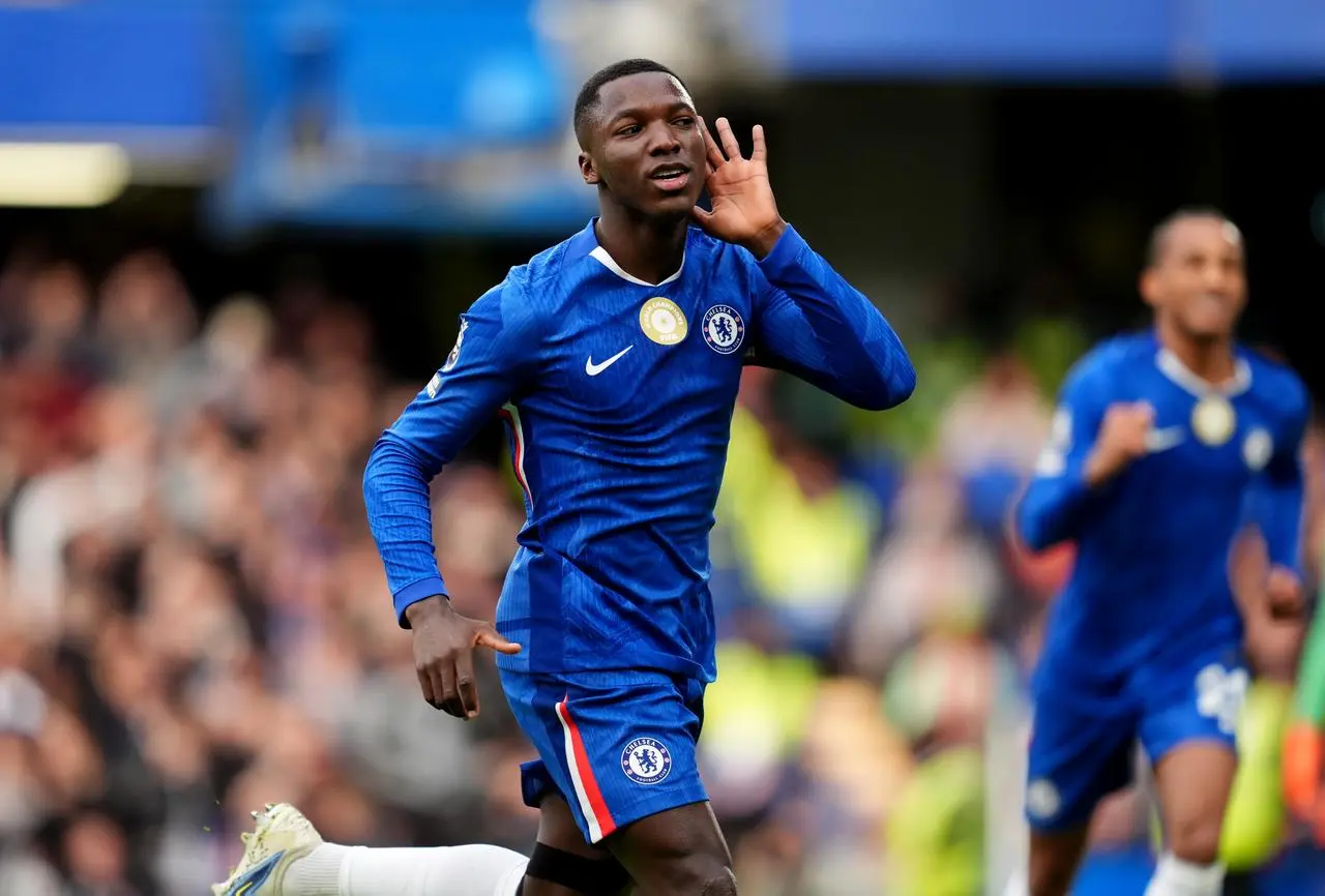 Moises Caicedo celebrates after opening the scoring against Liverpool at Stamford Bridge