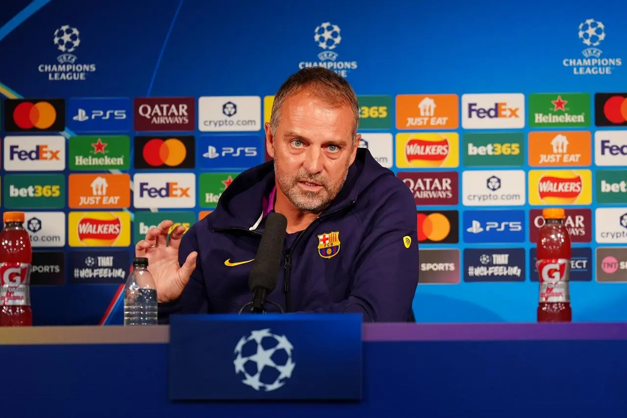 Hansi Flick talks at a Barcelona press conference.