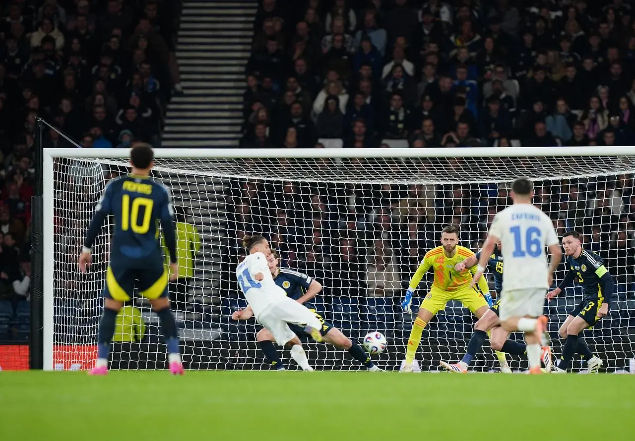 Kostas Tsimikas puts Greece ahead