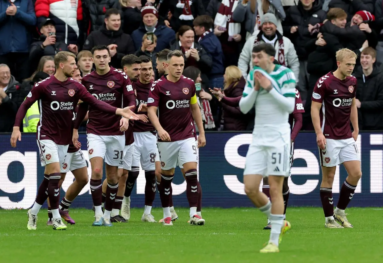 Colby Donovan reacts as Hearts celebrate their third goal 
