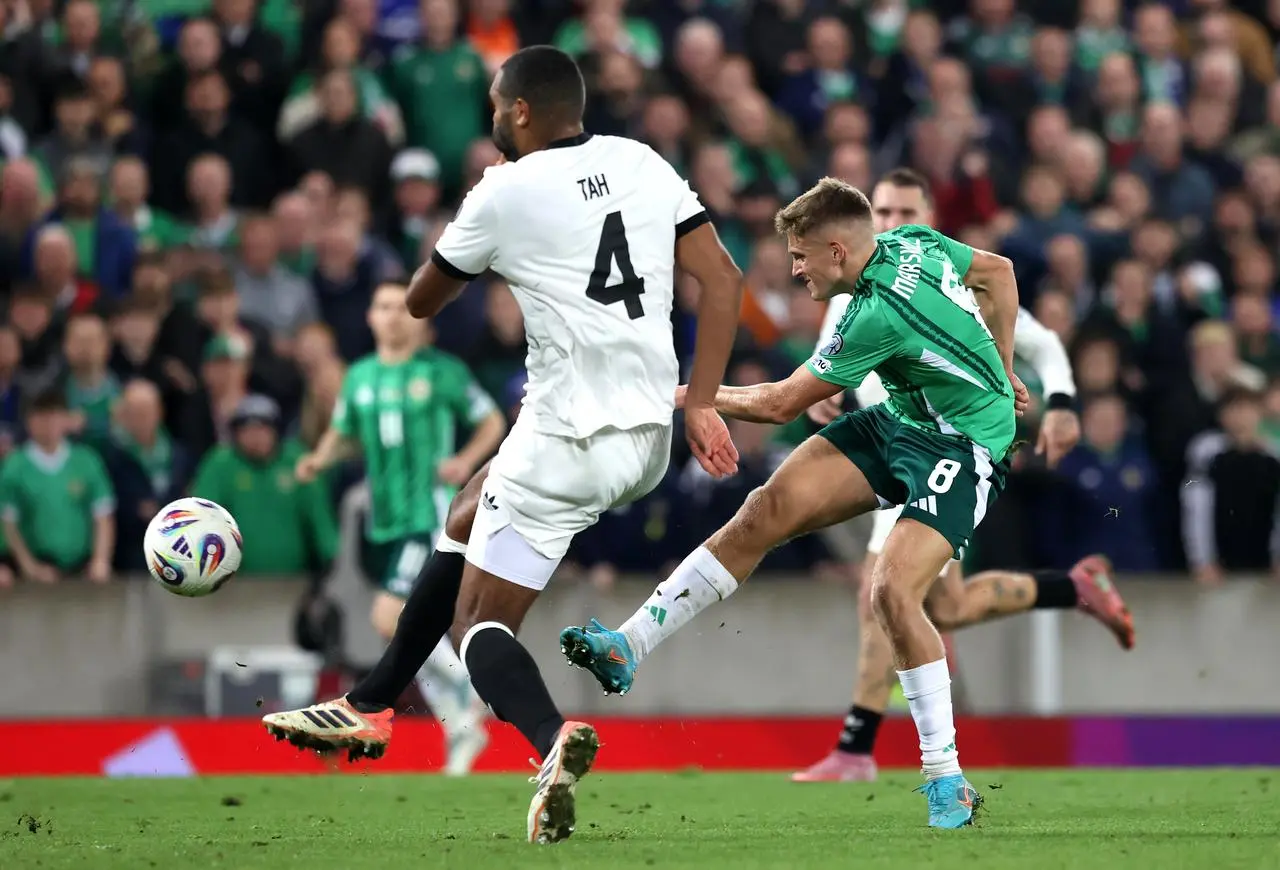 Northern Ireland’s Callum Marshall (right) attempts a shot 