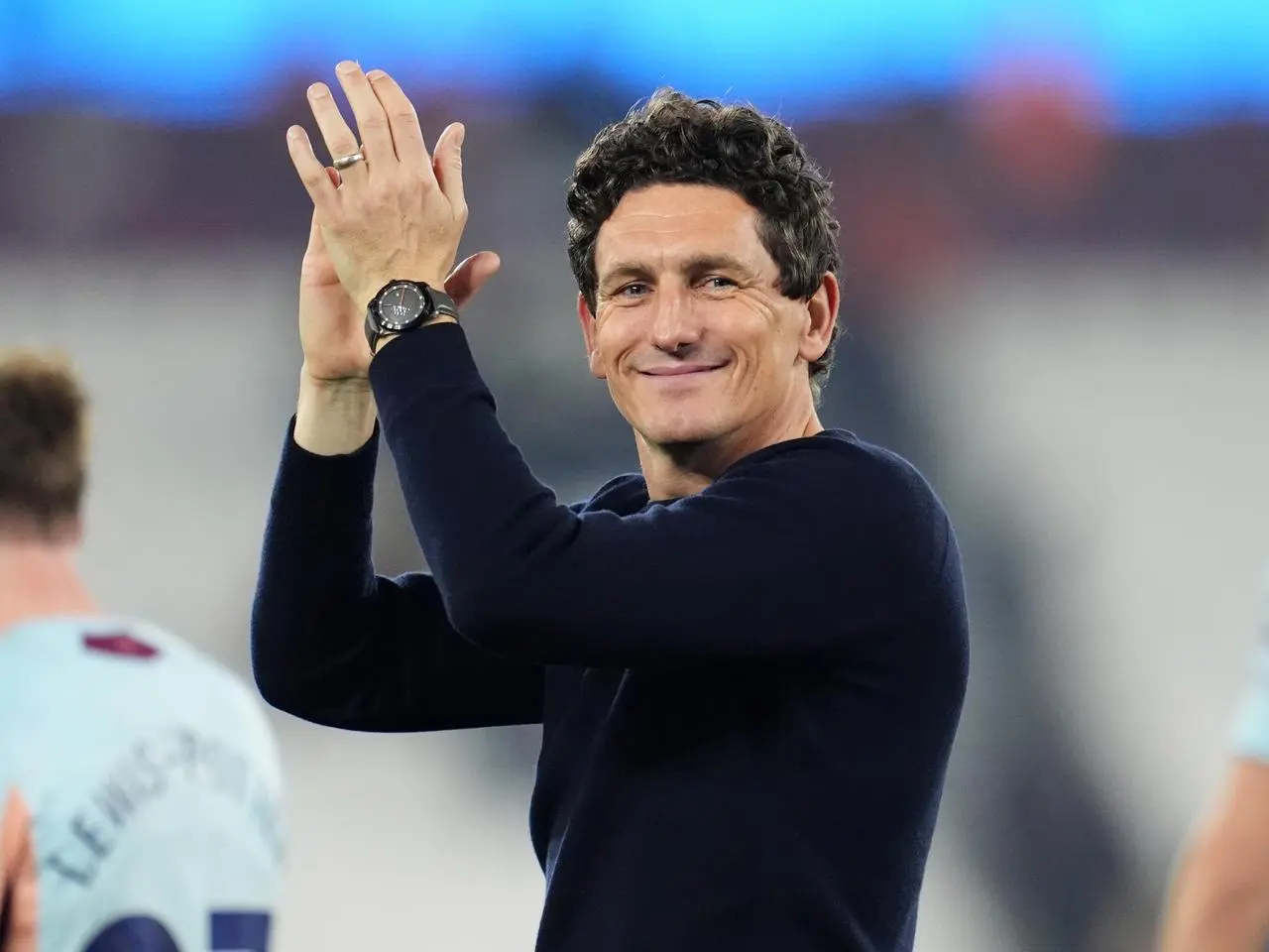Keith Andrews applauds