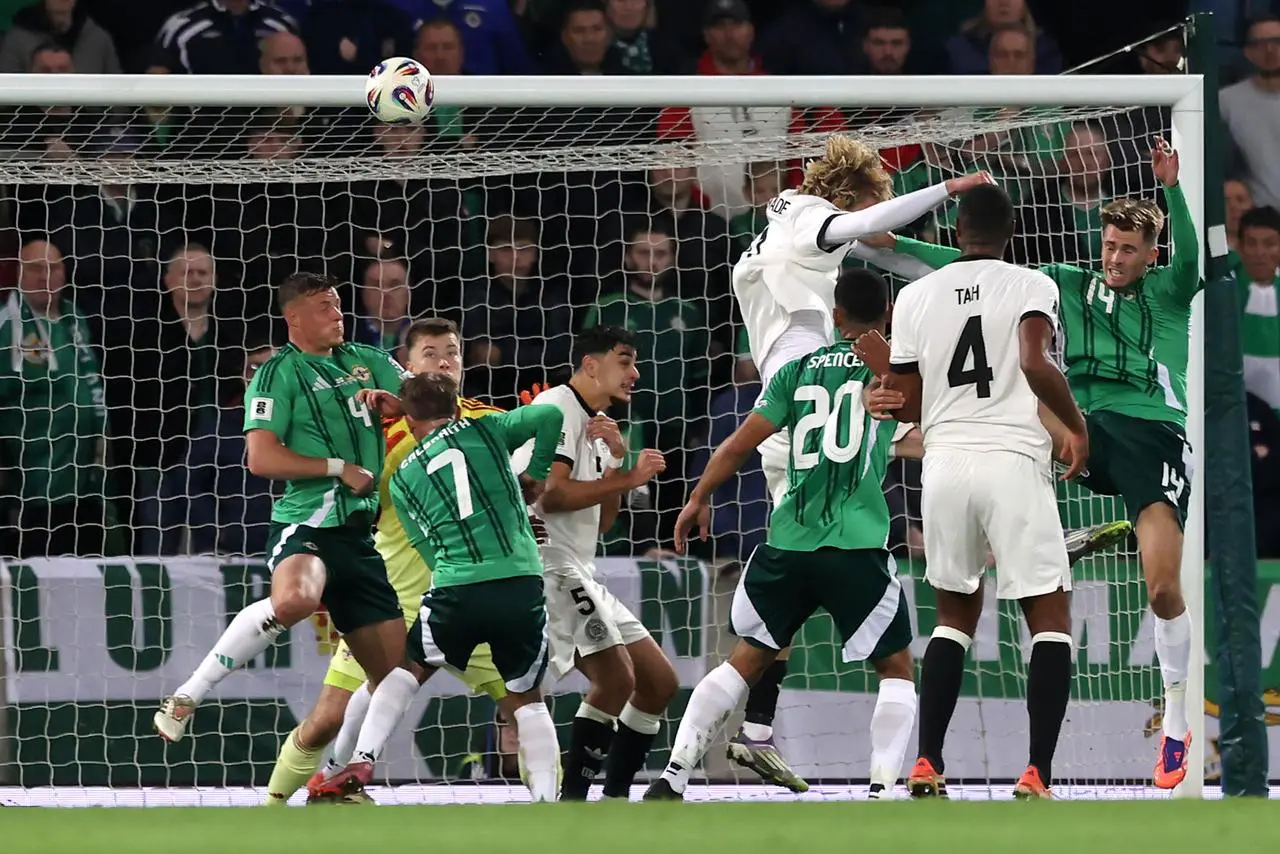 Germany’s Nick Woltemade (centre right) scores their side’s first goal