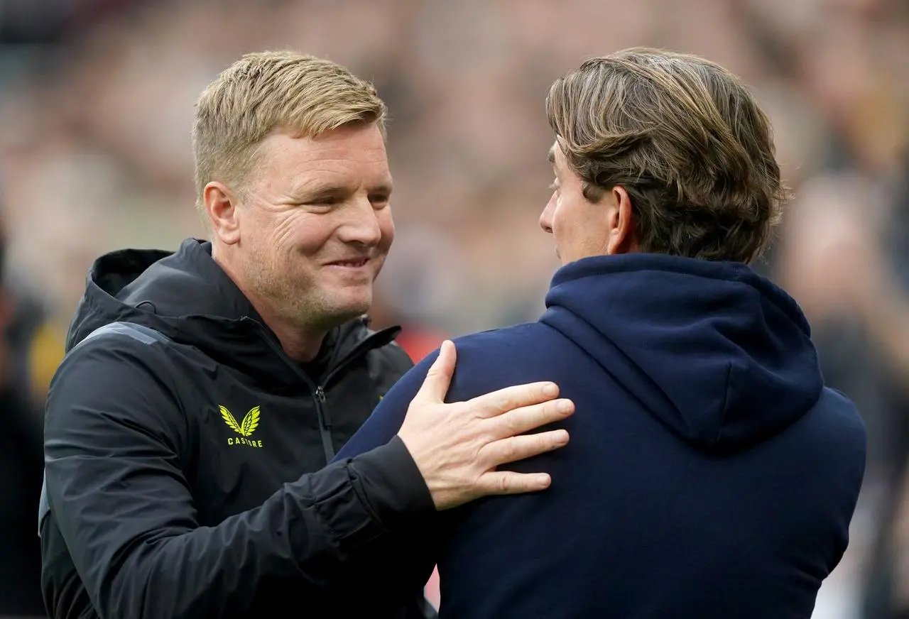 Newcastle manager Eddie Howe (left) and Brentford boss Thomas Frank greet each other