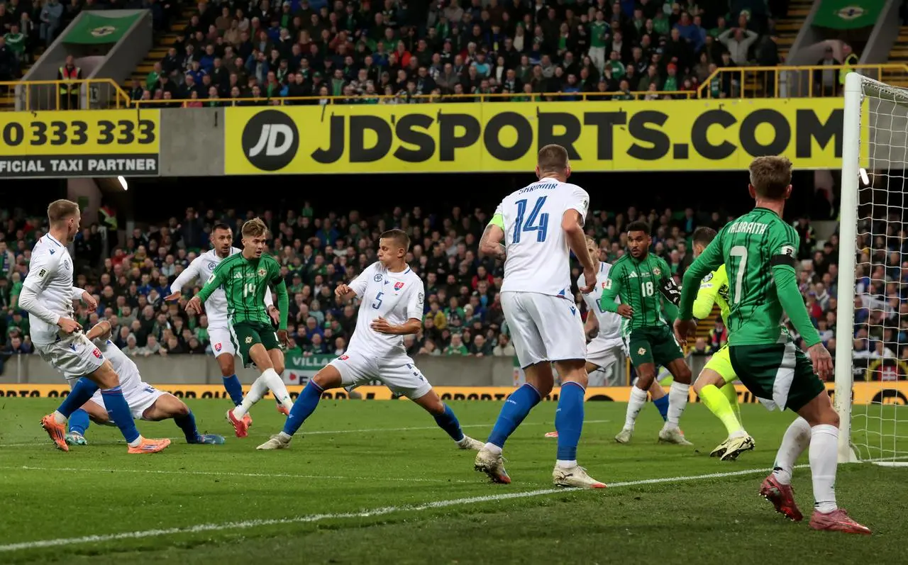 Slovakia’s Patrik Hrosovsky (second left) scores an own goal