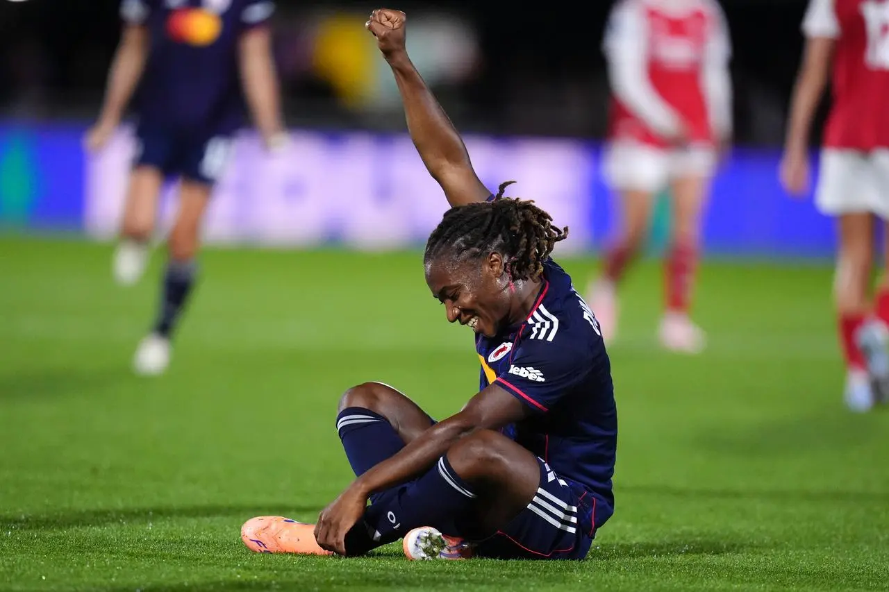 Melchie Dumornay celebrates her second goal against Arsenal