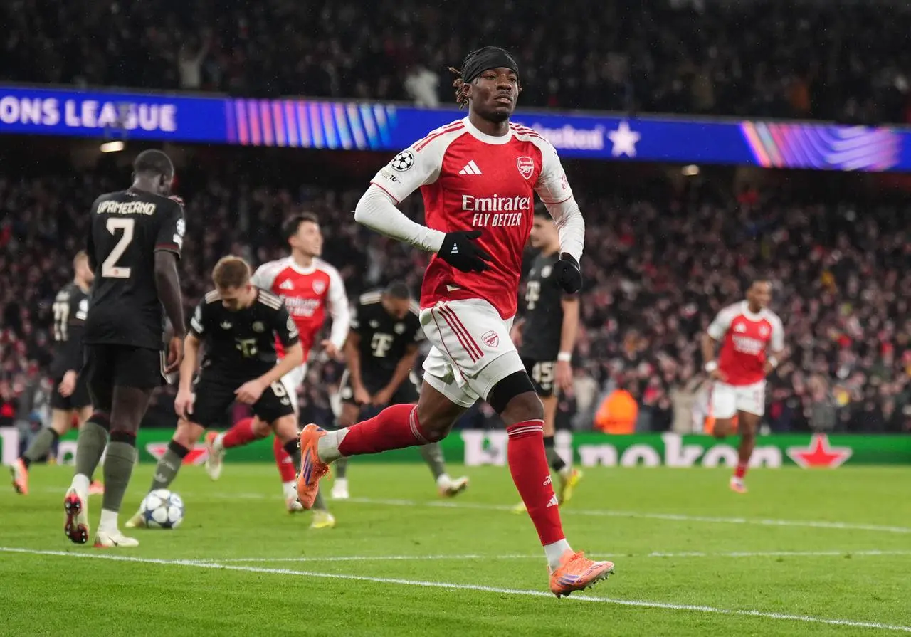 Noni Madueke celebrates scoring against Bayern Munich