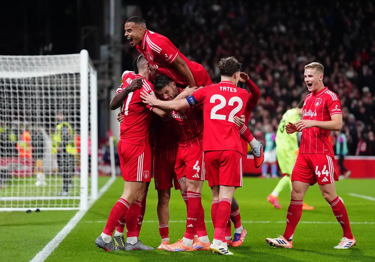 Nottingham Forest’s Murillo (top) celebrates with team-mates after a goal