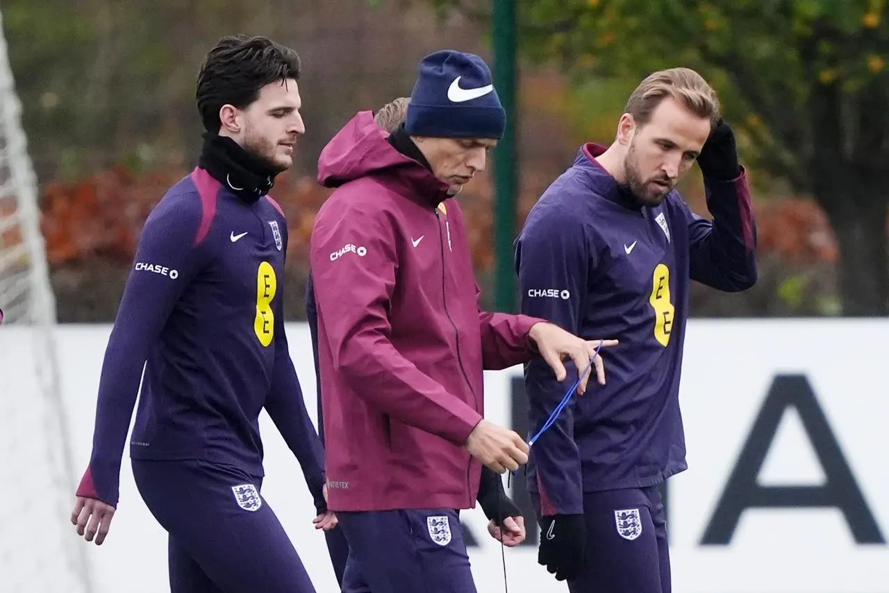 England’s Declan Rice, manager Thomas Tuchel and Harry Kane during a training session