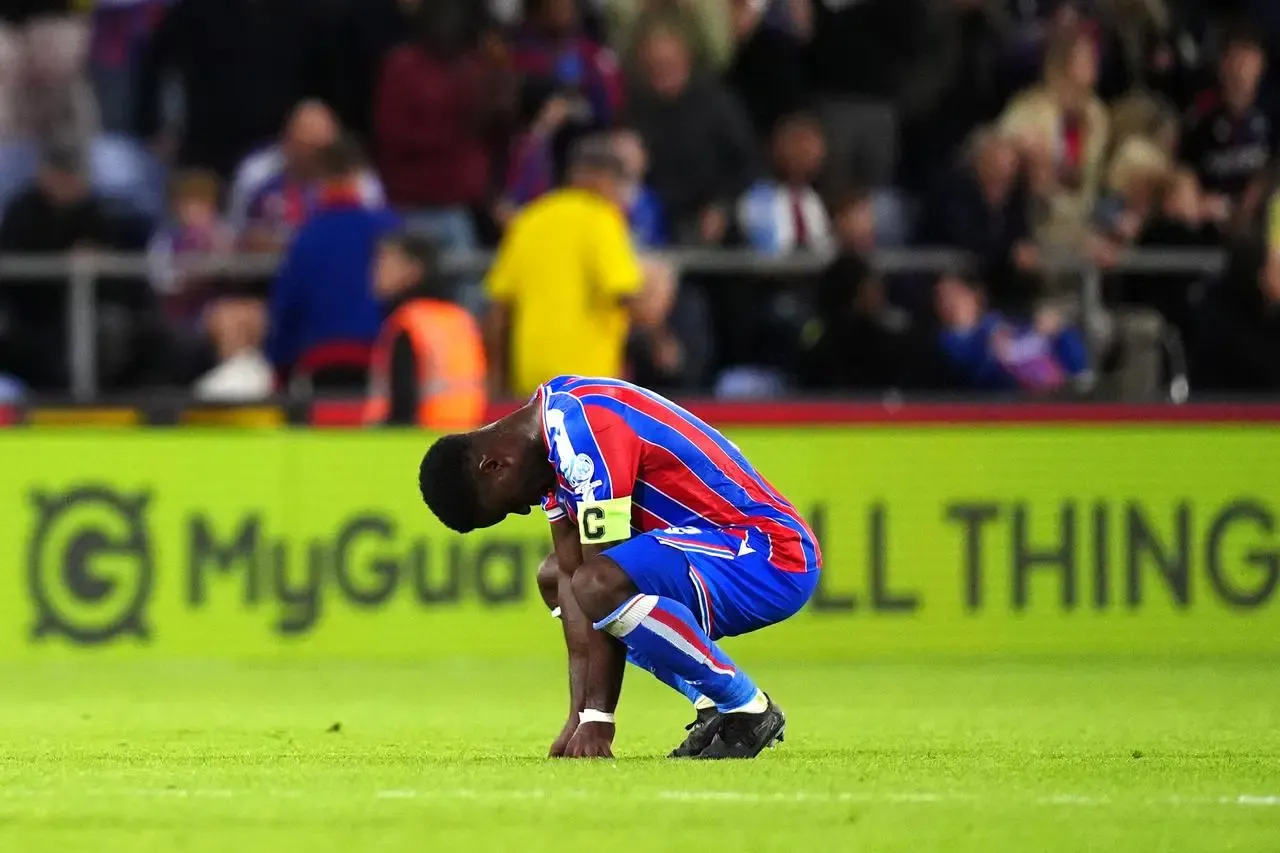 Crystal Palace’s Marc Guehi squats down