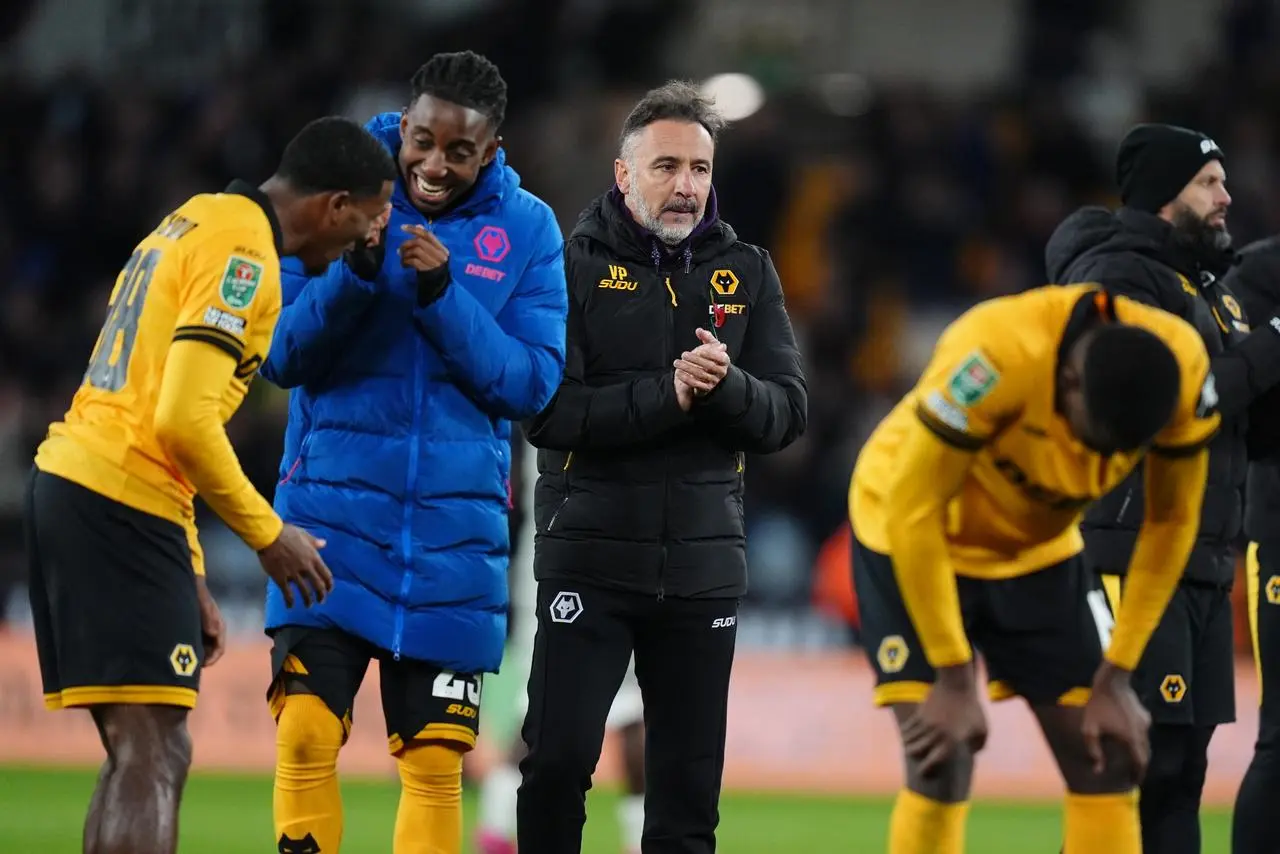 Wolves boss Vitor Pereira (third from left) after the final whistle at Fulham