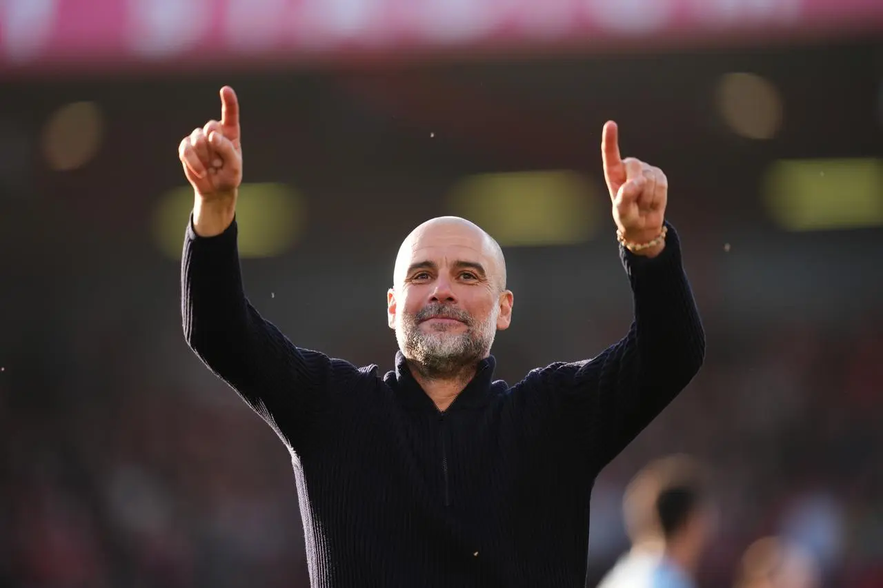 Pep Guardiola celebrates a Manchester City win