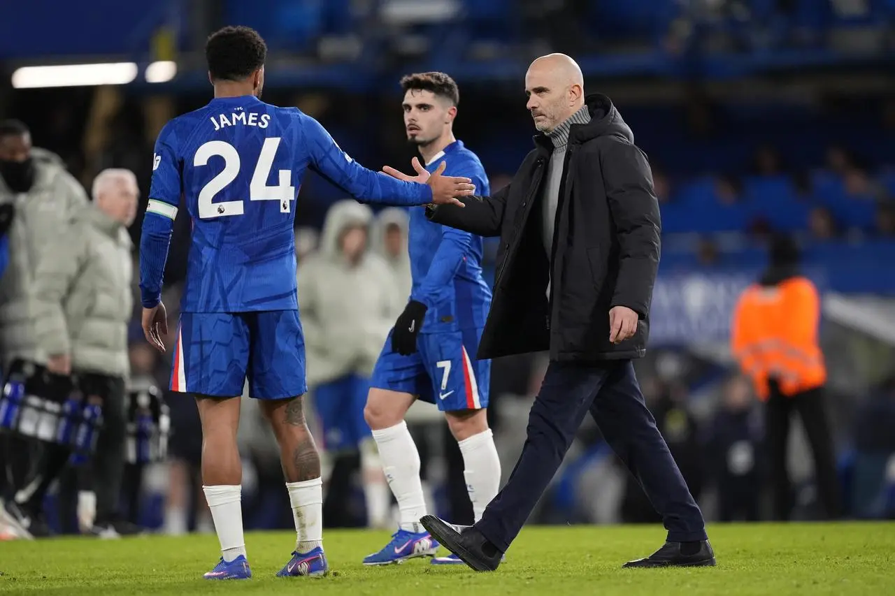 Enzo Maresca greets his players