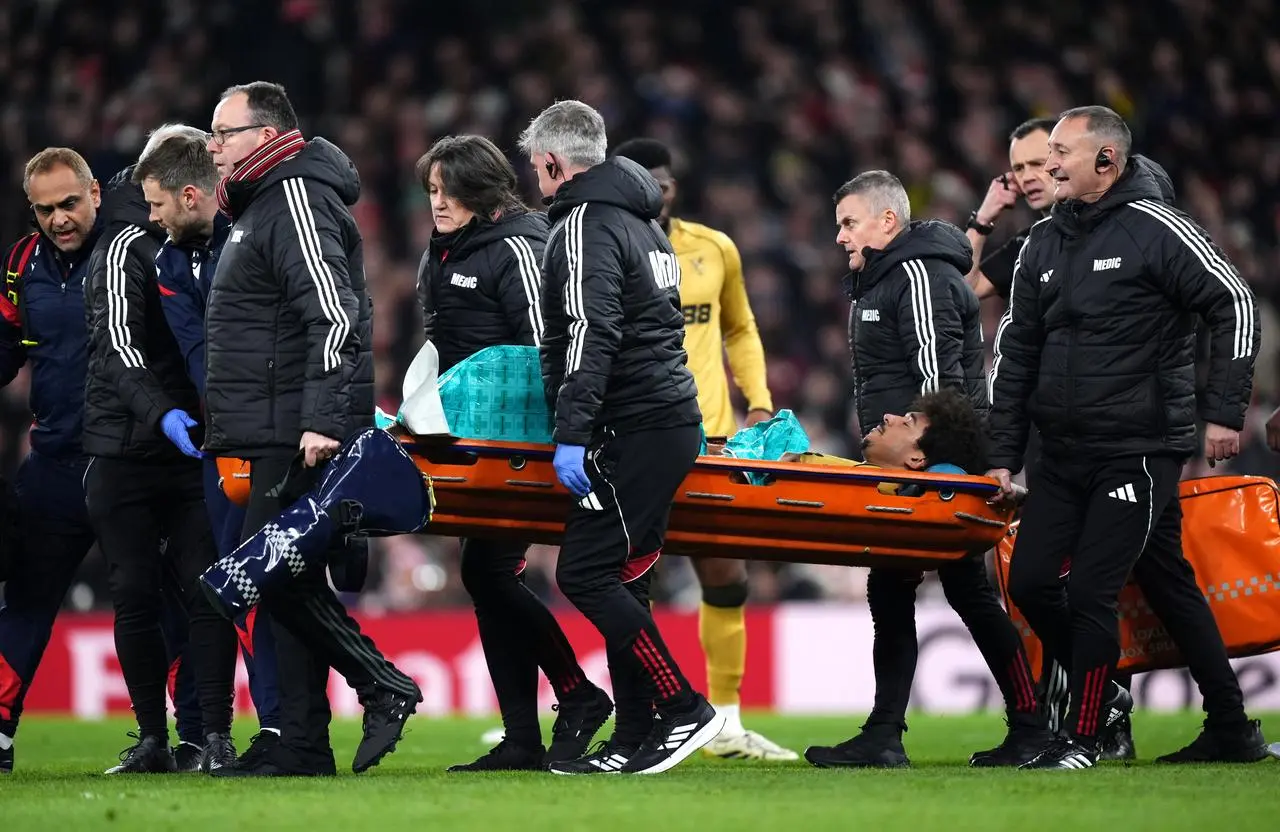Crystal Palace’s Chris Richards is taken off on a stretcher against Arsenal
