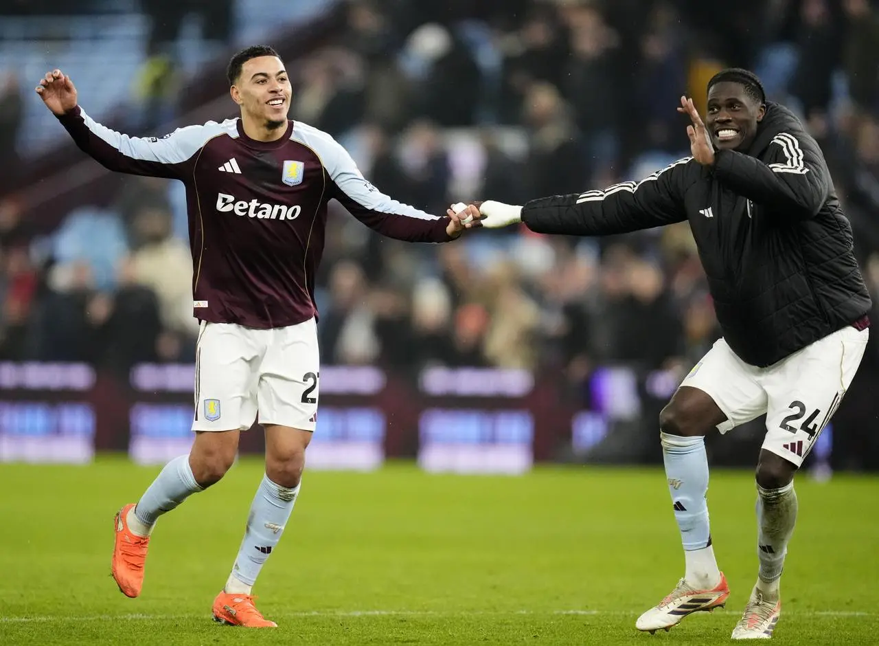 Aston Villa’s Morgan Rogers (left) and Amadou Onana celebrate