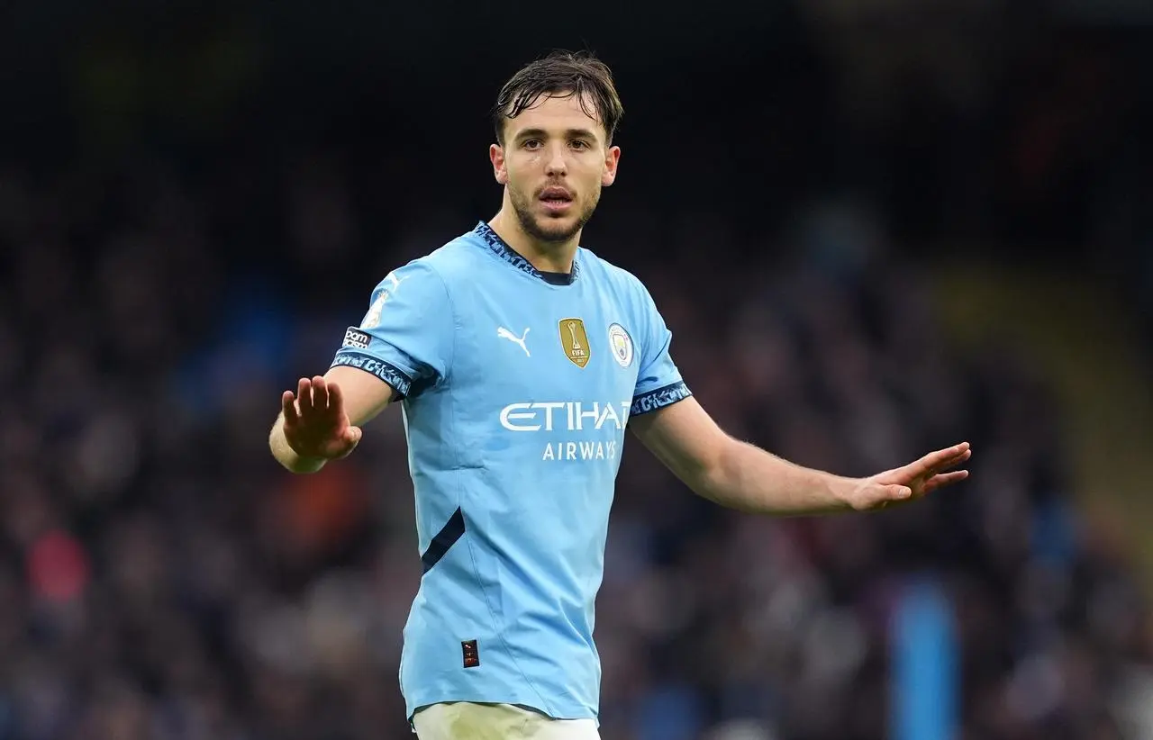 Manchester City’s Nico Gonzalez spreads his arms during a match