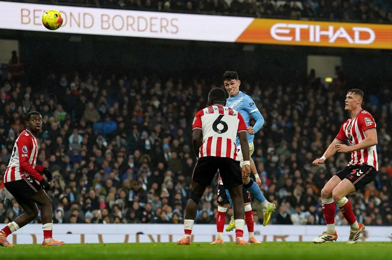 Phil Foden scores with a header
