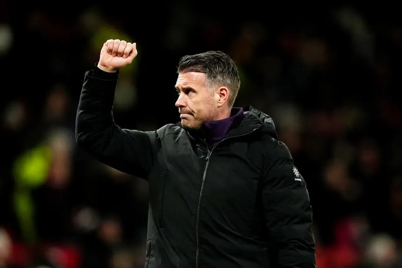 Wolves manager Rob Edwards salutes the fans