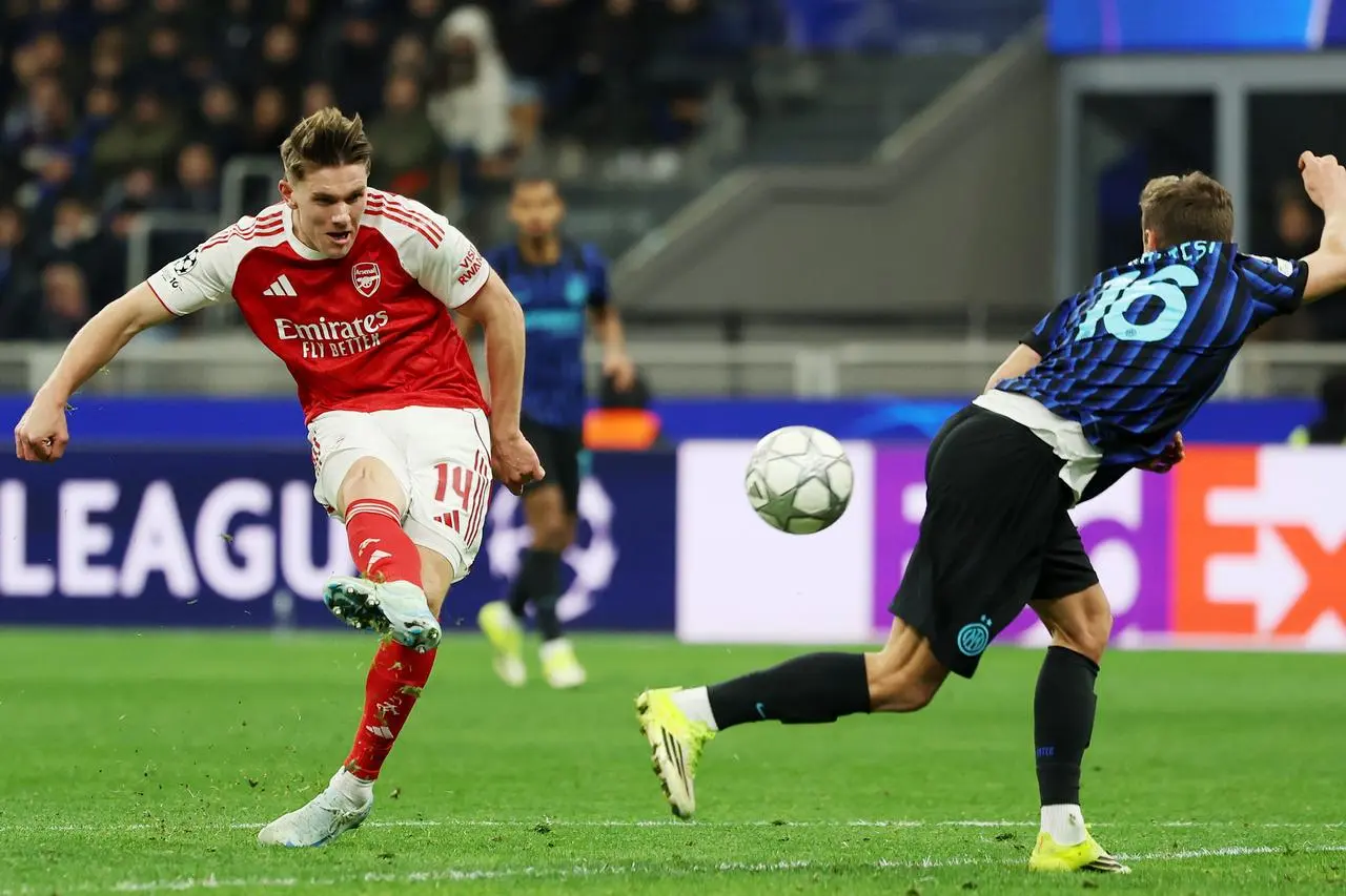 Viktor Gyokeres, left, scores Arsenal’s third goal against Inter Milan