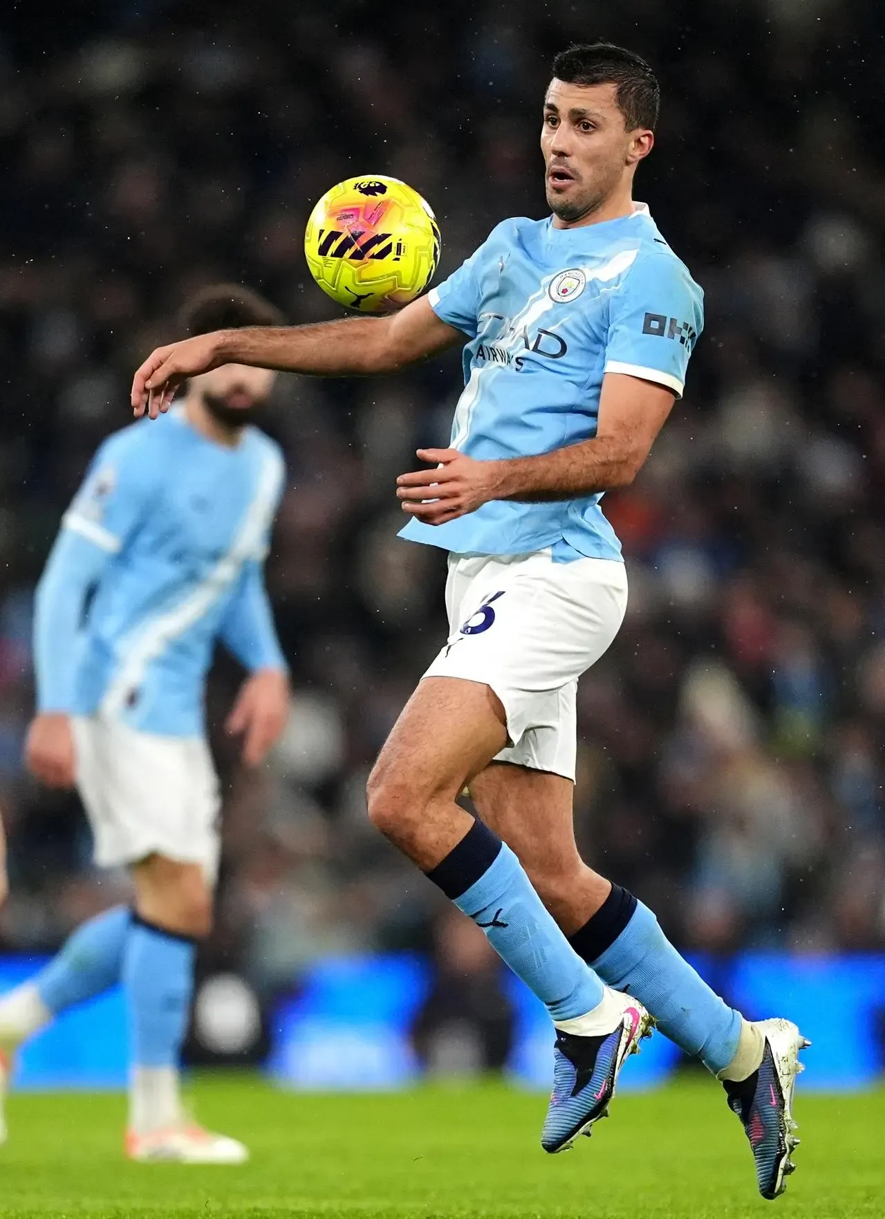 Manchester City’s Rodri controls the ball on his chest