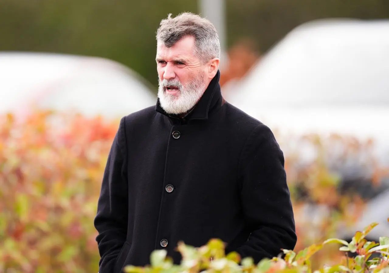 Roy Keane arrivign at a funeral