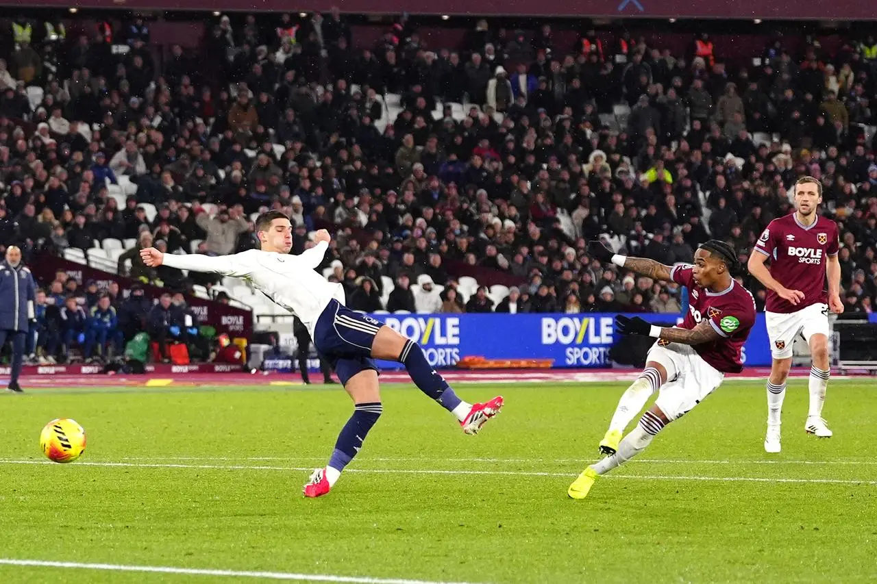 West Ham’s Crysencio Summerville, right, scores a goal which was then ruled out for offside by VAR