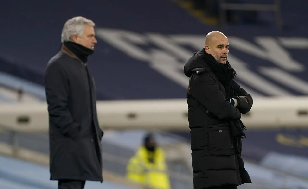 Pep Guardiola (right) and Jose Mourinho on the touchline