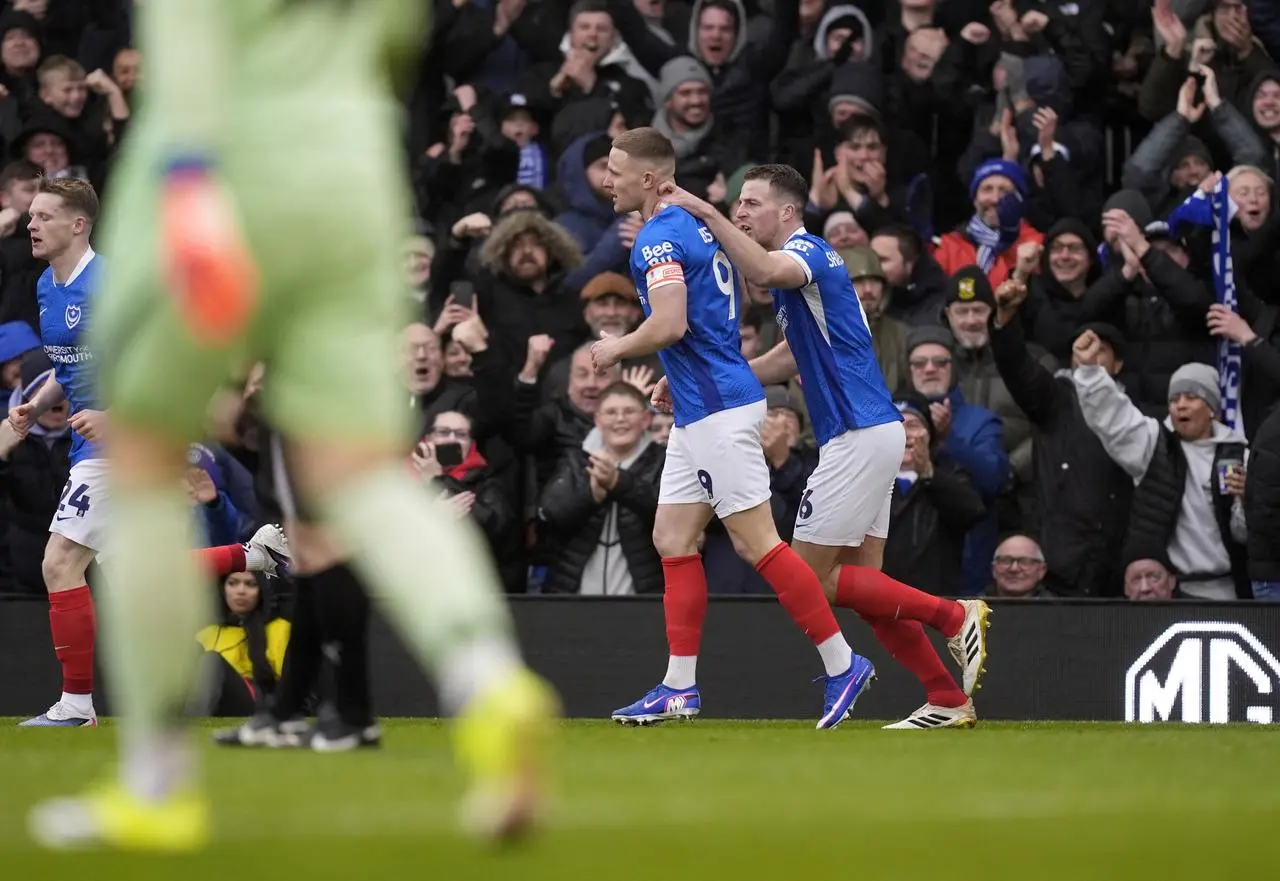 Colby Bishop celebrates scoring Portsmouth’s early goal against Arsenal