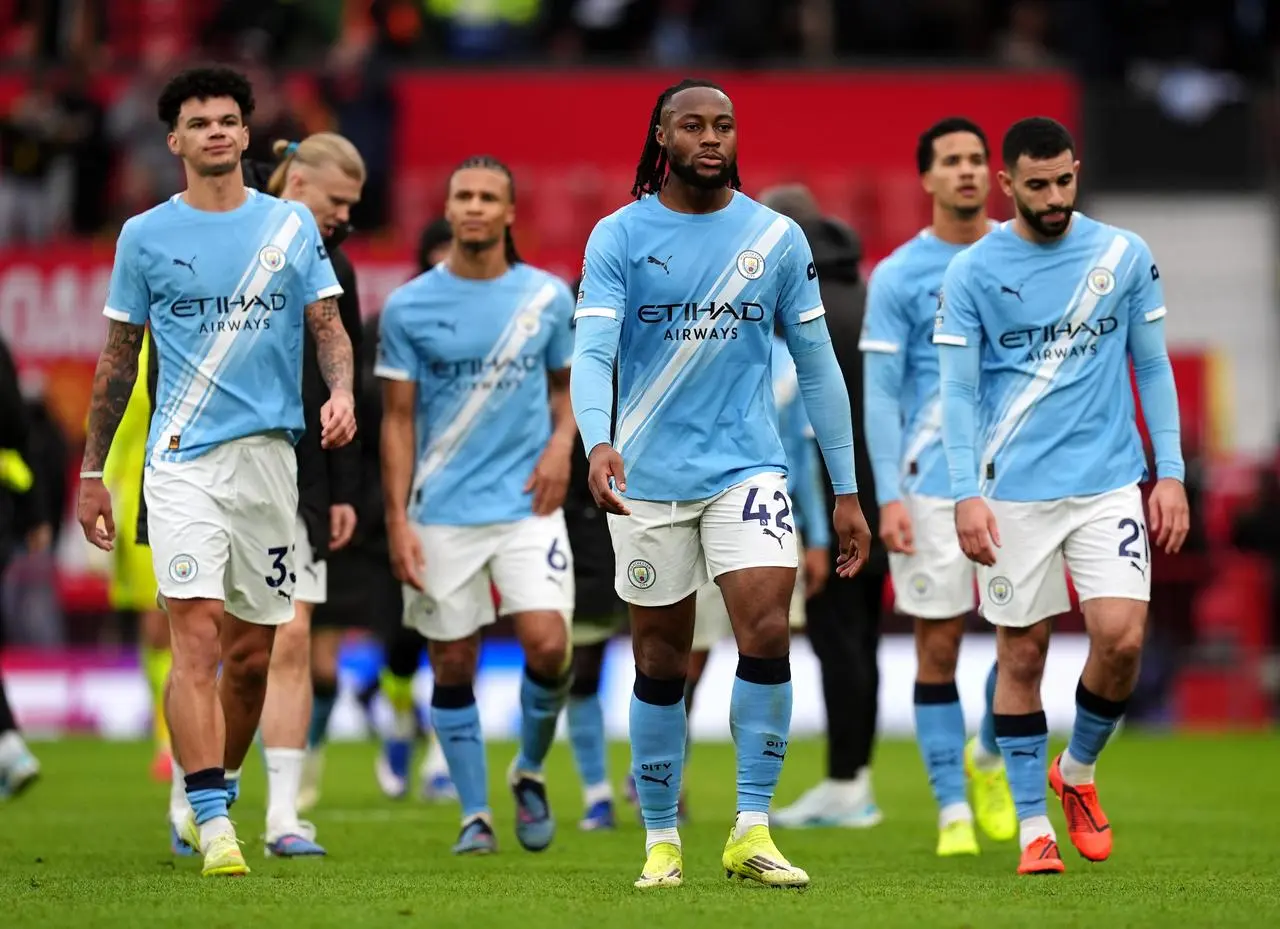 Manchester City players walk off dejected