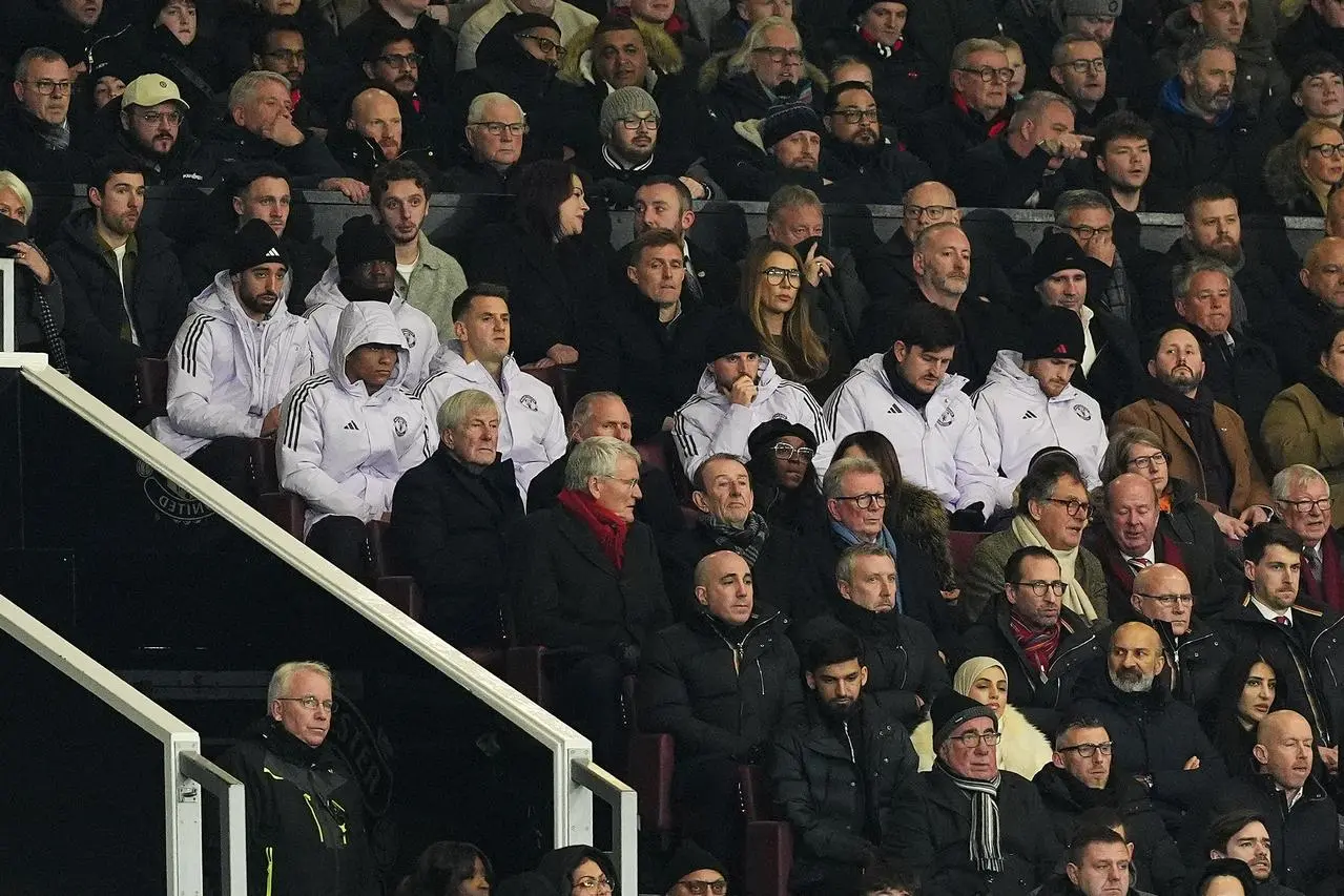 Manchester United’s Bruno Fernandes, Kobbie Mainoo, Mason Mount and Harry Maguire watch on from the stands
