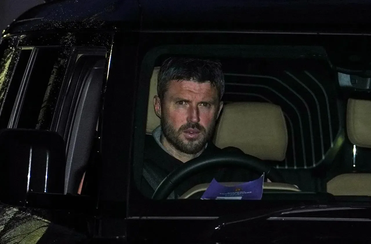 Manchester United head coach Michael Carrick arriving at the club's training complex in his car