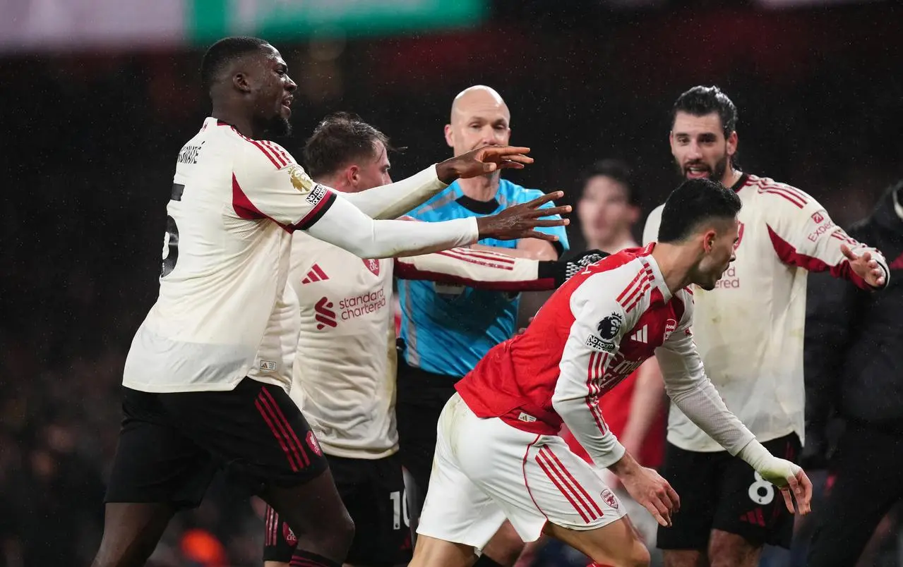 Liverpool’s Ibrahima Konate (left) pushes Arsenal’s Gabriel Martinelli 