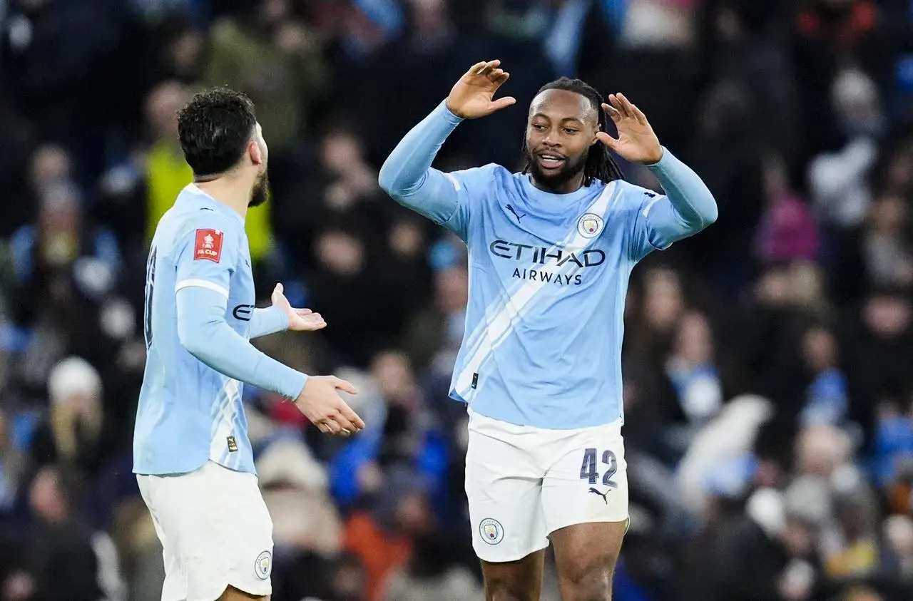 Antoine Semenyo celebrates scoring a goal for Manchester City