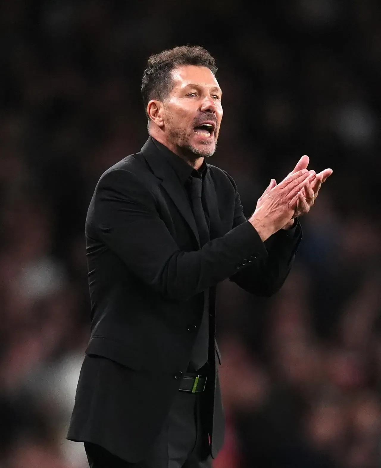 Atletico Madrid boss Diego Simeone gestures on the touchline during a Champions League match at Arsenal