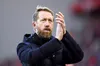 Brighton and Hove Albion manager Graham Potter applauds the fans