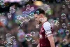 West Ham Captain Declan Rice is surrounded by bubbles at the London Stadium