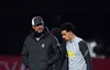 Liverpool manager Jurgen Klopp talks to young talent Curtis Jones