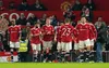 Man Utd players celebrate Scott McTOminay's opening goal against Aston Villa