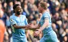 Manchester City players Raheem Sterling and Kevin De Bruyne celebrate their winning goal against Chelsea