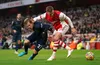 Burnley striker Matej Vydra tries to get past Arsenal's Rob Holding at The Emirates Stadium