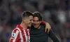 Sergi Canos with his arm around Brentford manager Thomas Frank