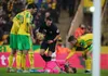 Norwich goalkeeper Tim Krul lays prone on the ground with a shoulder injury