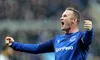 Wayne Rooney celebrates scoring for his boyhood club Everton