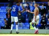 Everton players Yerry Mina and Richarlison celebrate