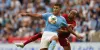 Fabinho tackles Manchester City midfielder Rodri in the Community Shield at the King Power