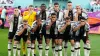 Germany’s players cover their mouths in protest at being blocked from wearing the OneLove armband (Mike Egerton/PA)